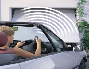 operator being used to open a remote controlled garage door